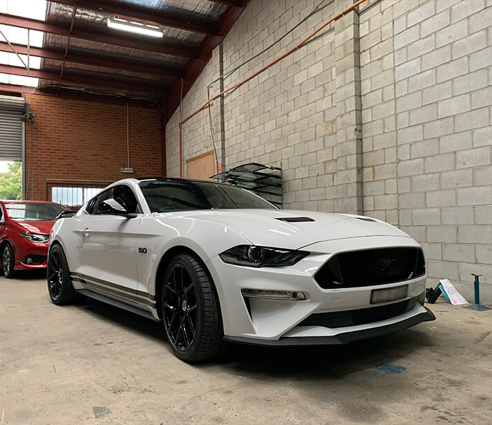 Detailing of white Mustang in Castle Hill