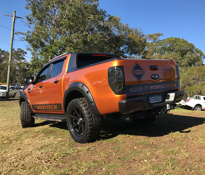 Hydrographic services for cars in Sydney on orange Ford Ranger