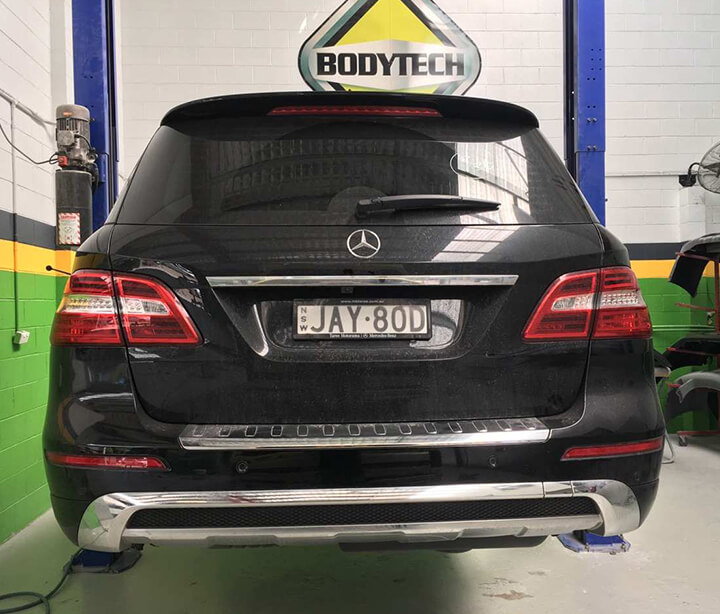 Black Mercedes in for smash repairs at Castle Hill