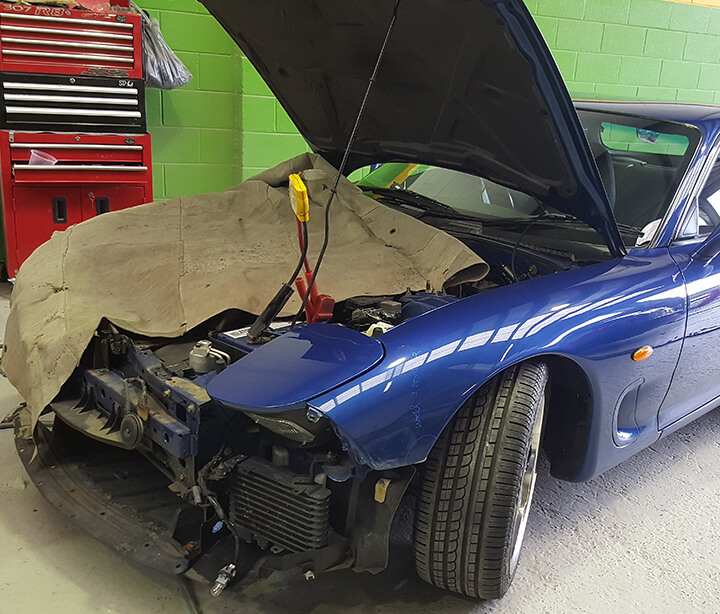 RX7 vehicle getting service and smash repairs in Castle Hill