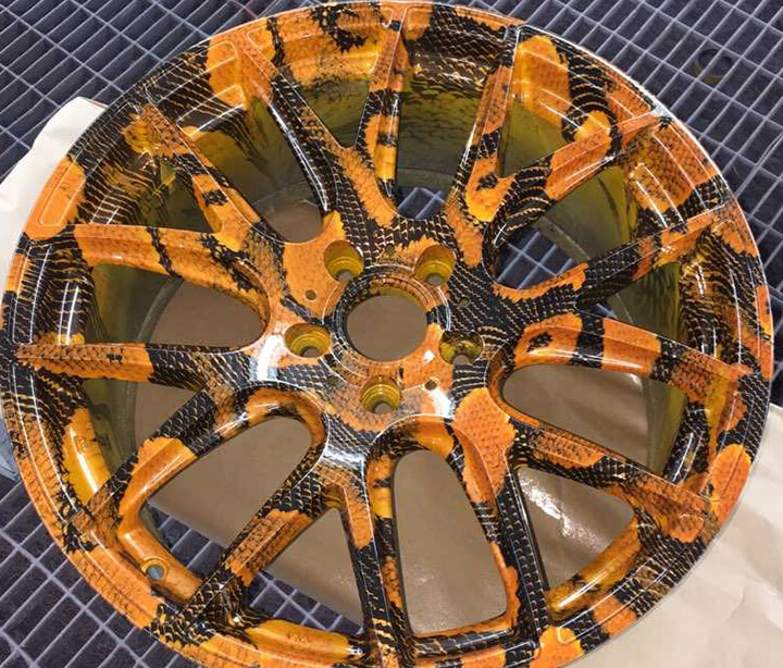 Orange snake hydrographic on rim covers