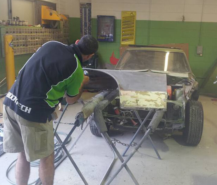 Bodytech member working on Nissan 240z car restoration