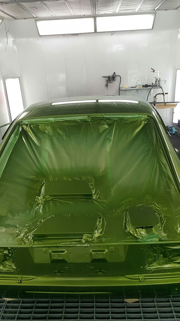 Nissan 240z car restoration with green spray paint