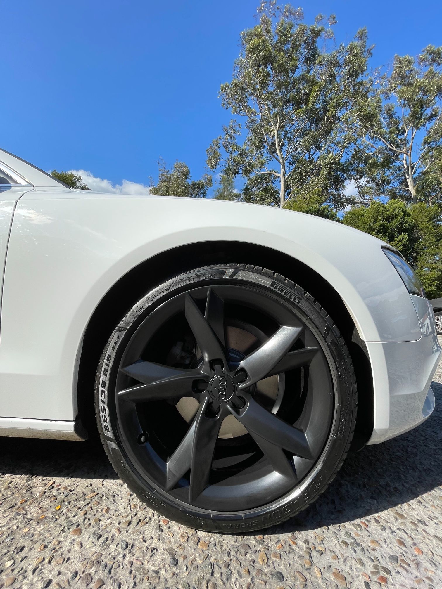 White car with black rims Sydney
