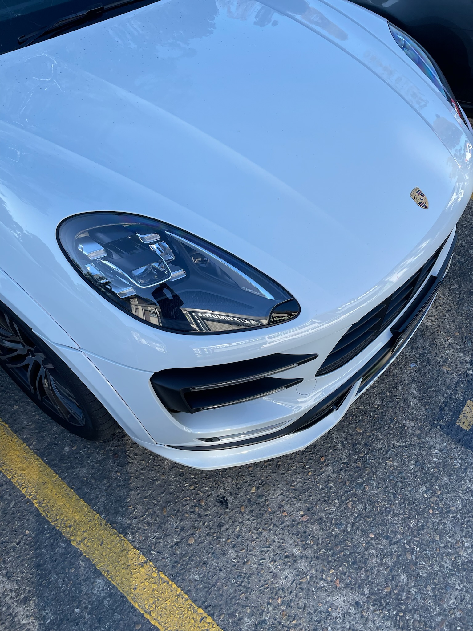 White Porsche front hood