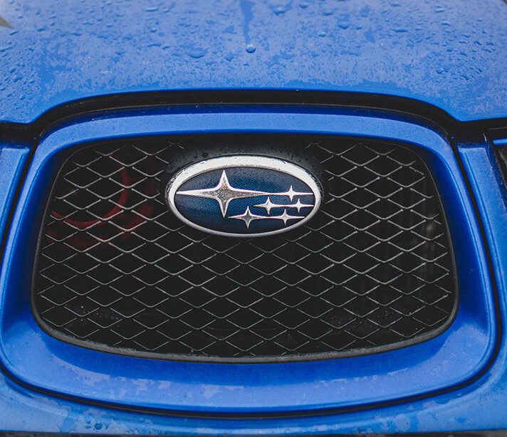 blue car subaru logo