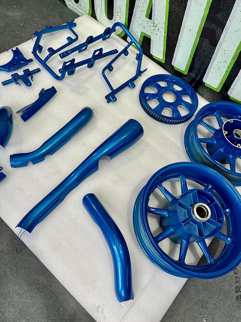 powder coating and spray painting blue parts 2