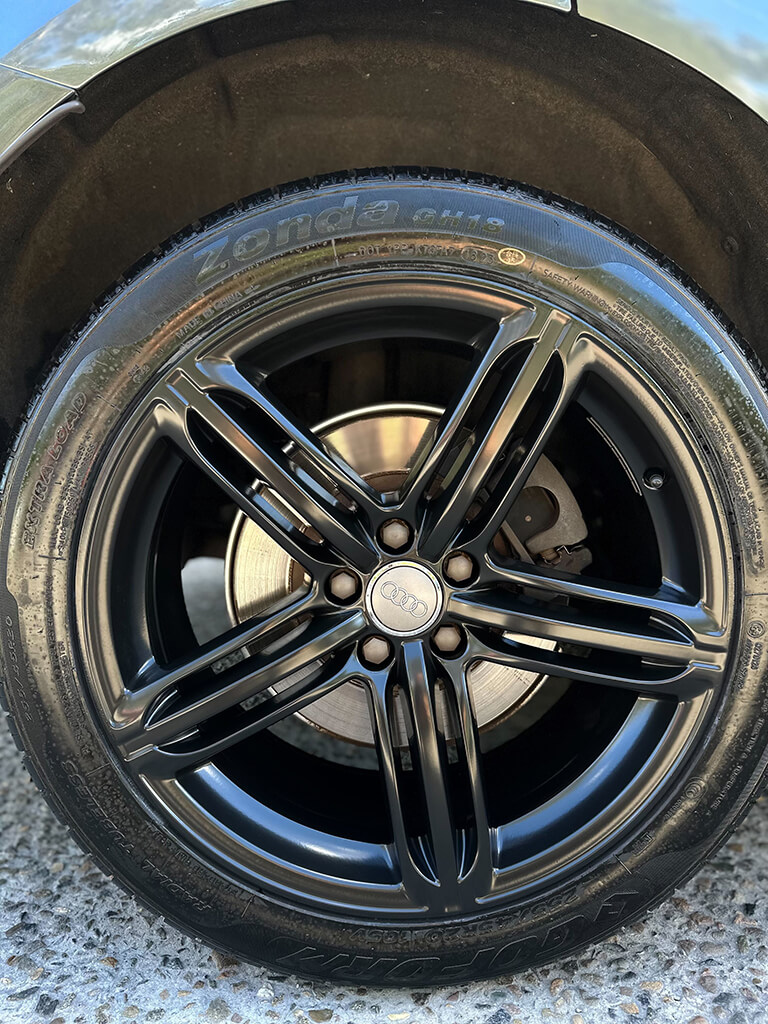 Power Coating Audi a close up of a tire